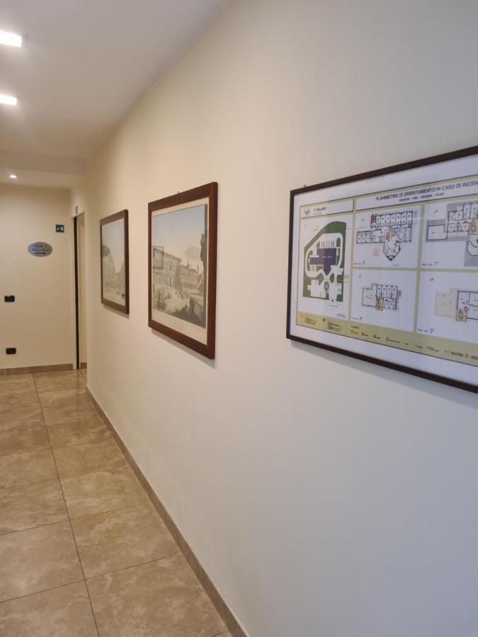 Elysium Hotel Raya Mediglia Bagian luar foto
